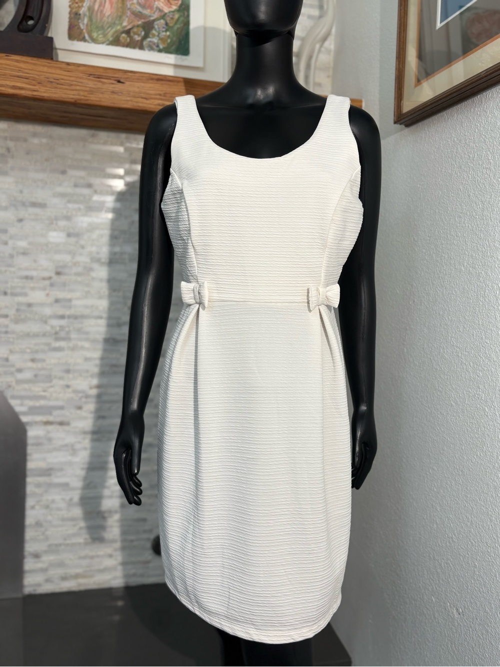 LC Lauren Conrad dress features decorative bows at the waist